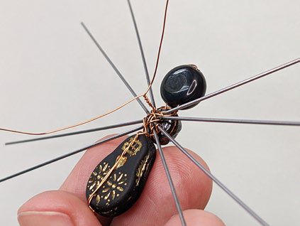 Twist the ends of the wire together.